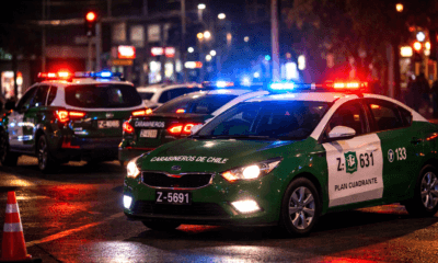 Autos de carabineros por copamiento policial